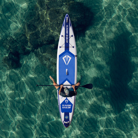 A man was paddleboarding on warrior 12′5″ inflatable stand up paddle board