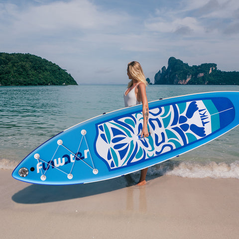 A woman was carrying FUNWATER OCEAN TIKI 10'6